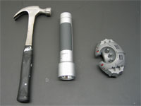 The hammer, flashlight and robot used in the experiment.